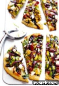 A delicious Brussels Sprouts and Bacon Flatbread Pizza, ready to be served.