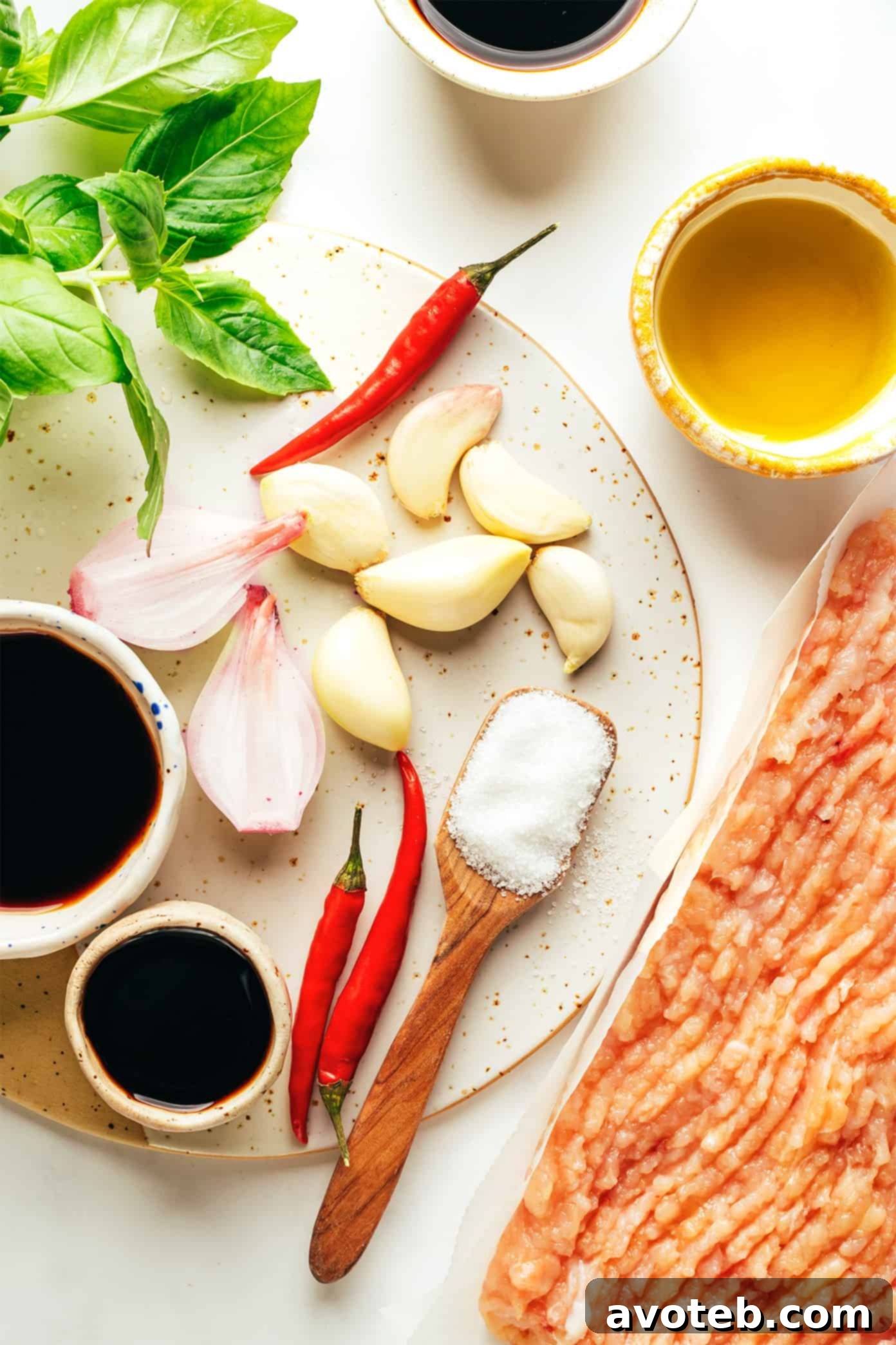 Ingredients for Thai Basil Chicken laid out on a cutting board