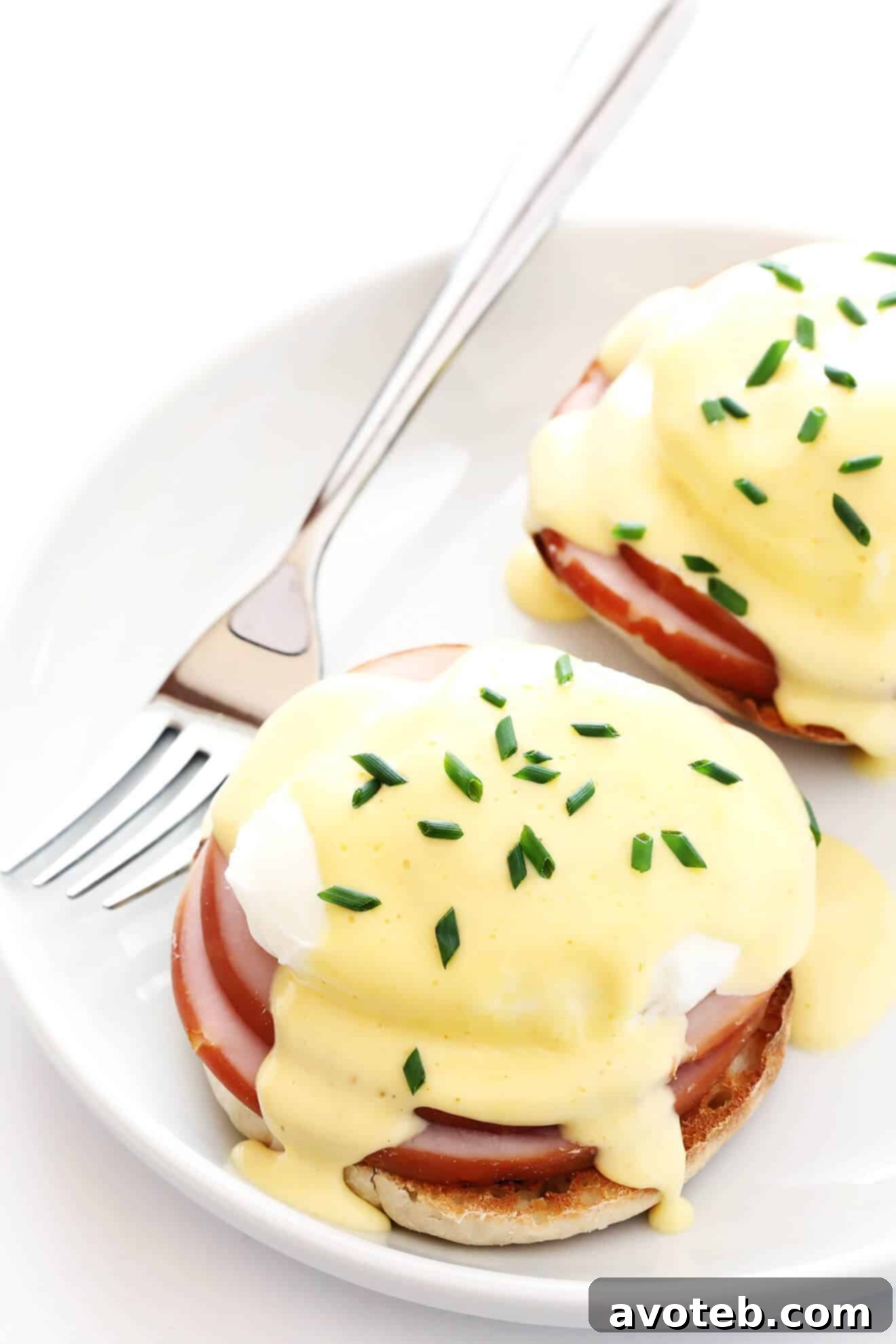 This is my favorite recipe for classic Eggs Benedict. The blender Hollandaise sauce is surprisingly easy to make, and so tasty! | gimmesomeoven.com
