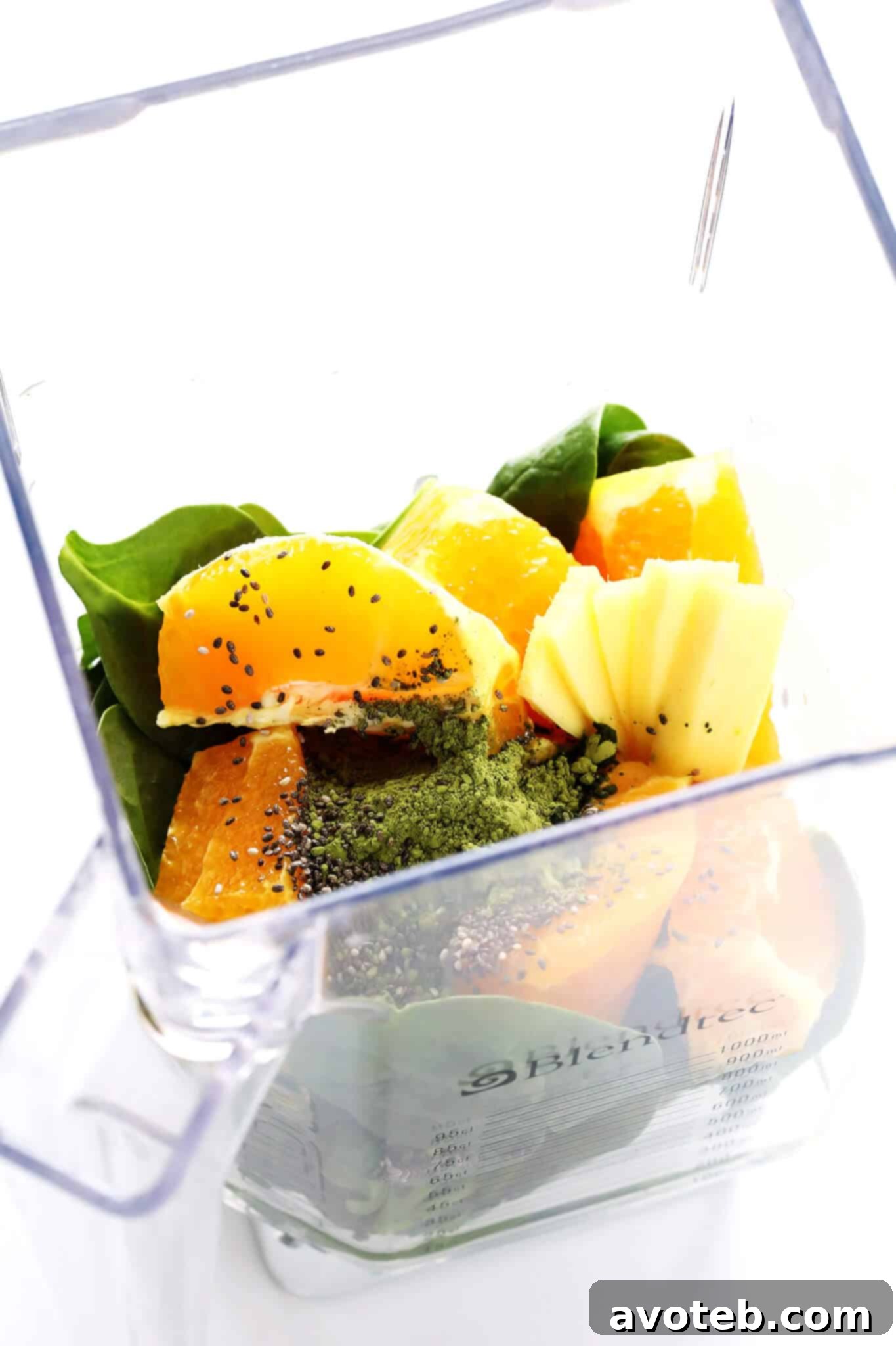 A shot of all the smoothie ingredients laid out on a kitchen counter, ready for blending.