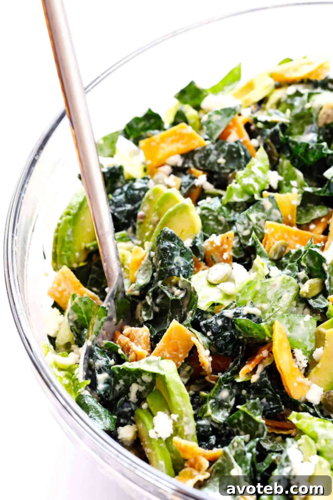This amazing Mexican Caesar Salad features avocado, crispy tortilla strips, pepitas, zesty cotija cheese, fresh lime juice, and an incredible creamy Greek Yogurt Caesar Dressing.