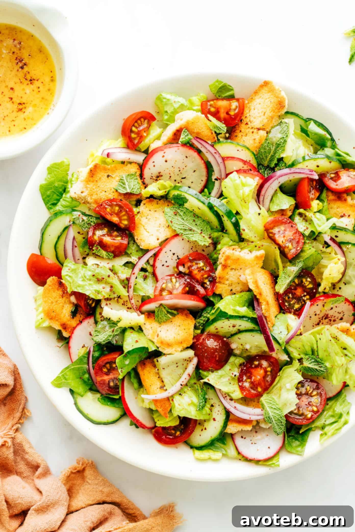 Variety of fresh Fattoush salad ingredients in a bowl