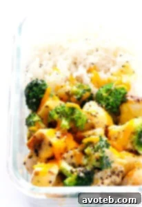 Cheesy Broccoli, Chicken and Rice Bowls with extra cheddar on top