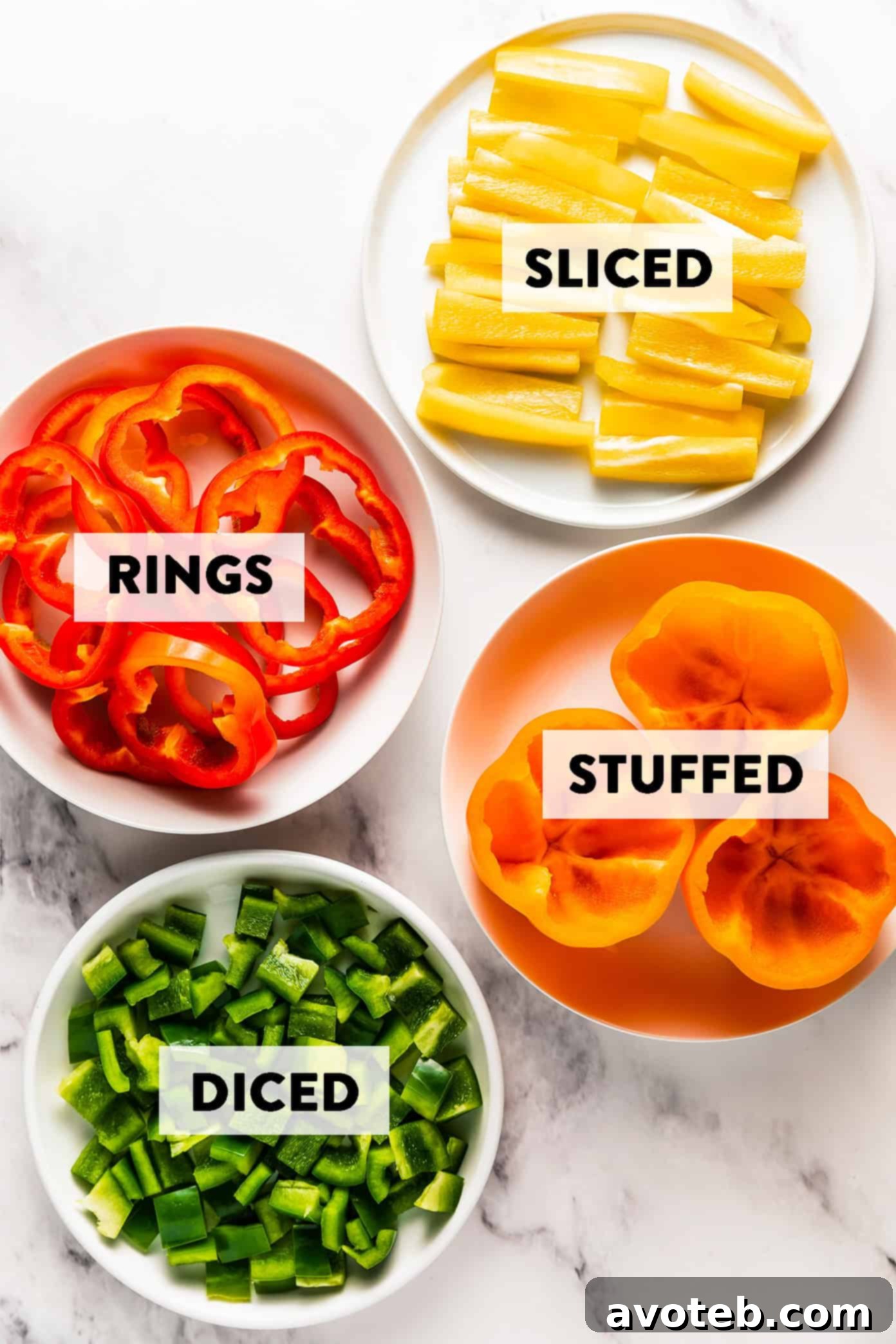 Cut Bell Peppers Like a Pro 2 Fresh, vibrant bell peppers on a cutting board, ready to be prepped.