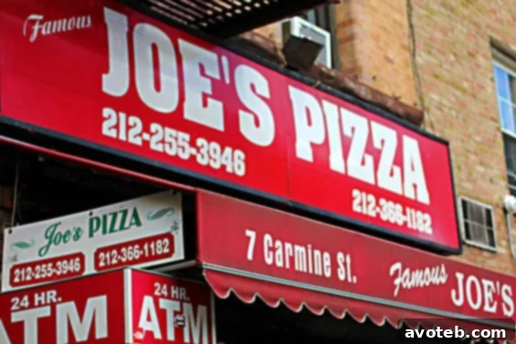 Delicious pizza slice on a Greenwich Village Food Tour Classic New York style pizza slice from Joe's Pizza