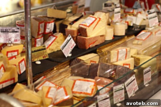 Artisan cheese selection Shelves full of artisan cheeses at Murray's Cheese