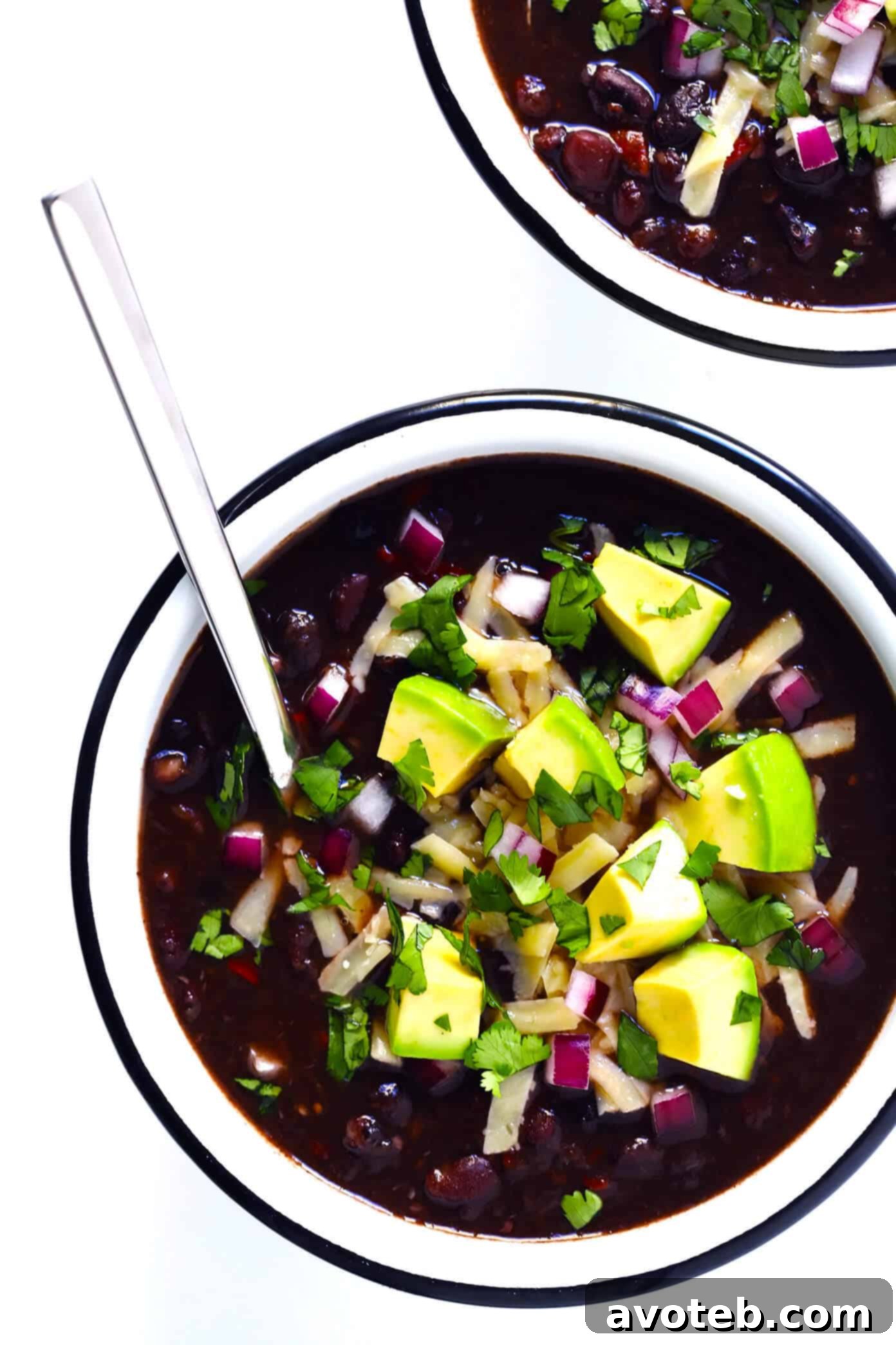 The BEST Black Bean Chili Recipe with Avocado and Cilantro - A delicious and healthy meal.