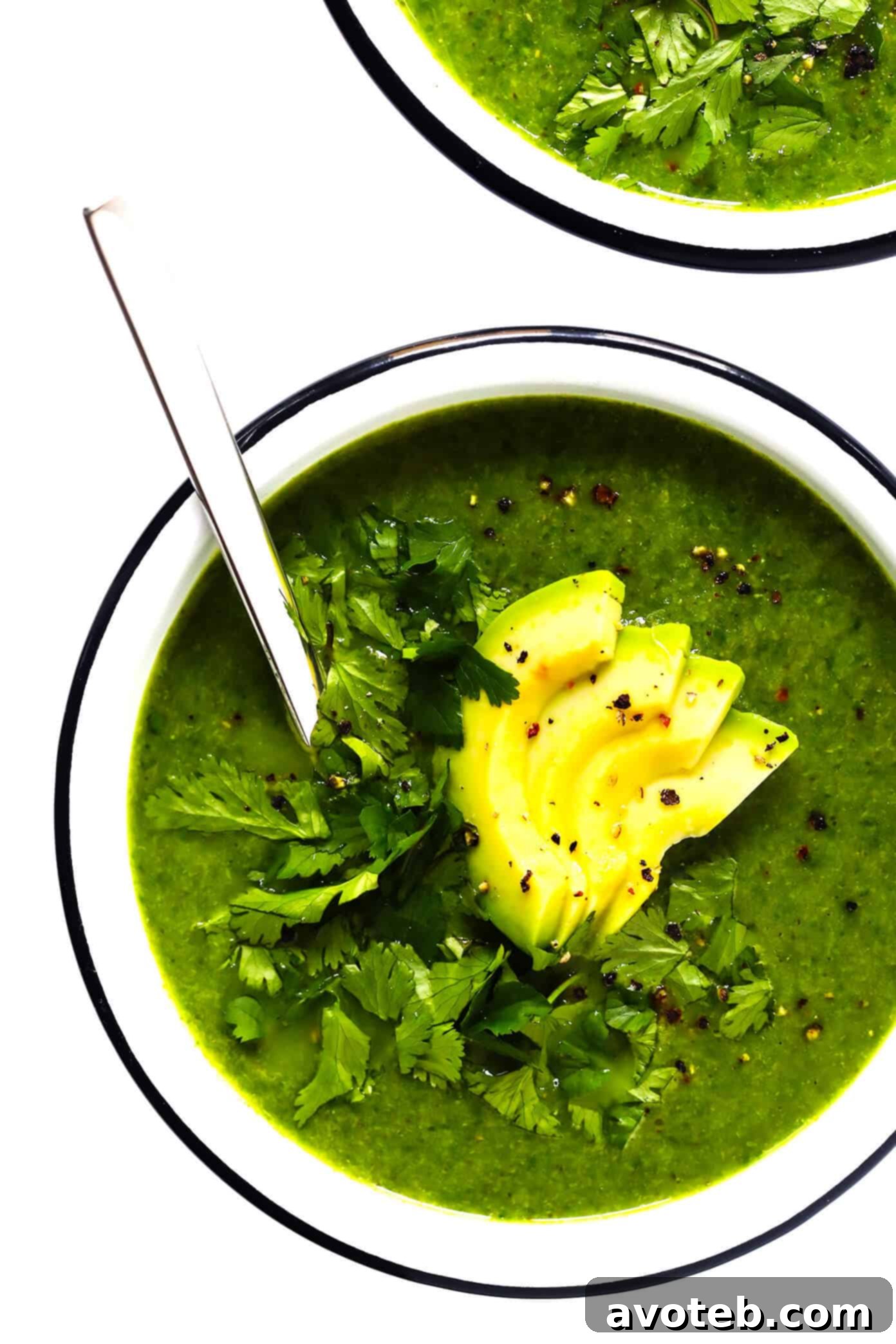 Green Goddess Soup: a healthy, quick, and easy vegan & gluten-free recipe packed with broccoli, cauliflower, and spinach. Perfect for a detox or a feel-good meal! Green Goddess Soup with Avocado in Bowl