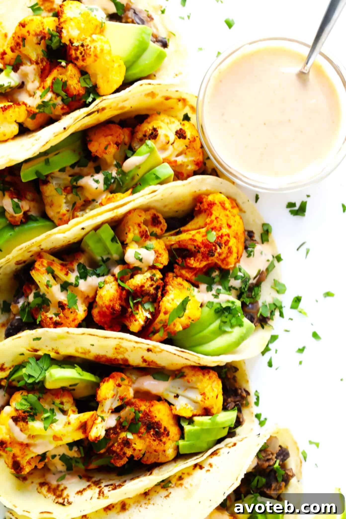 Finished Roasted Cauliflower and Black Bean Tacos with Crema