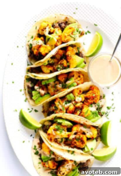 Roasted Cauliflower and Black Bean Vegetarian Tacos Recipe with Crema