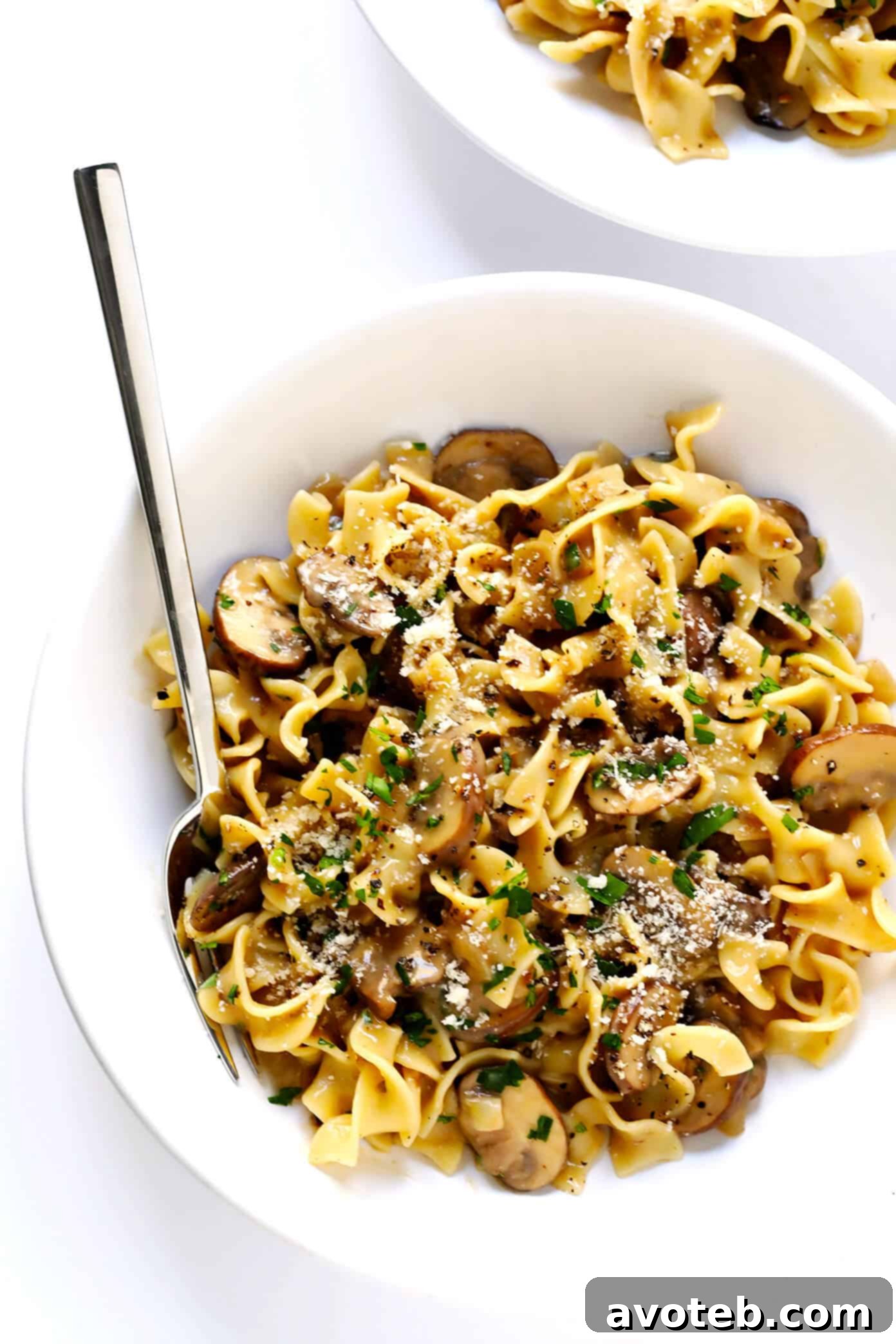 Vegetarian Mushroom Stroganoff with Egg Noodles, perfectly coated in rich sauce.