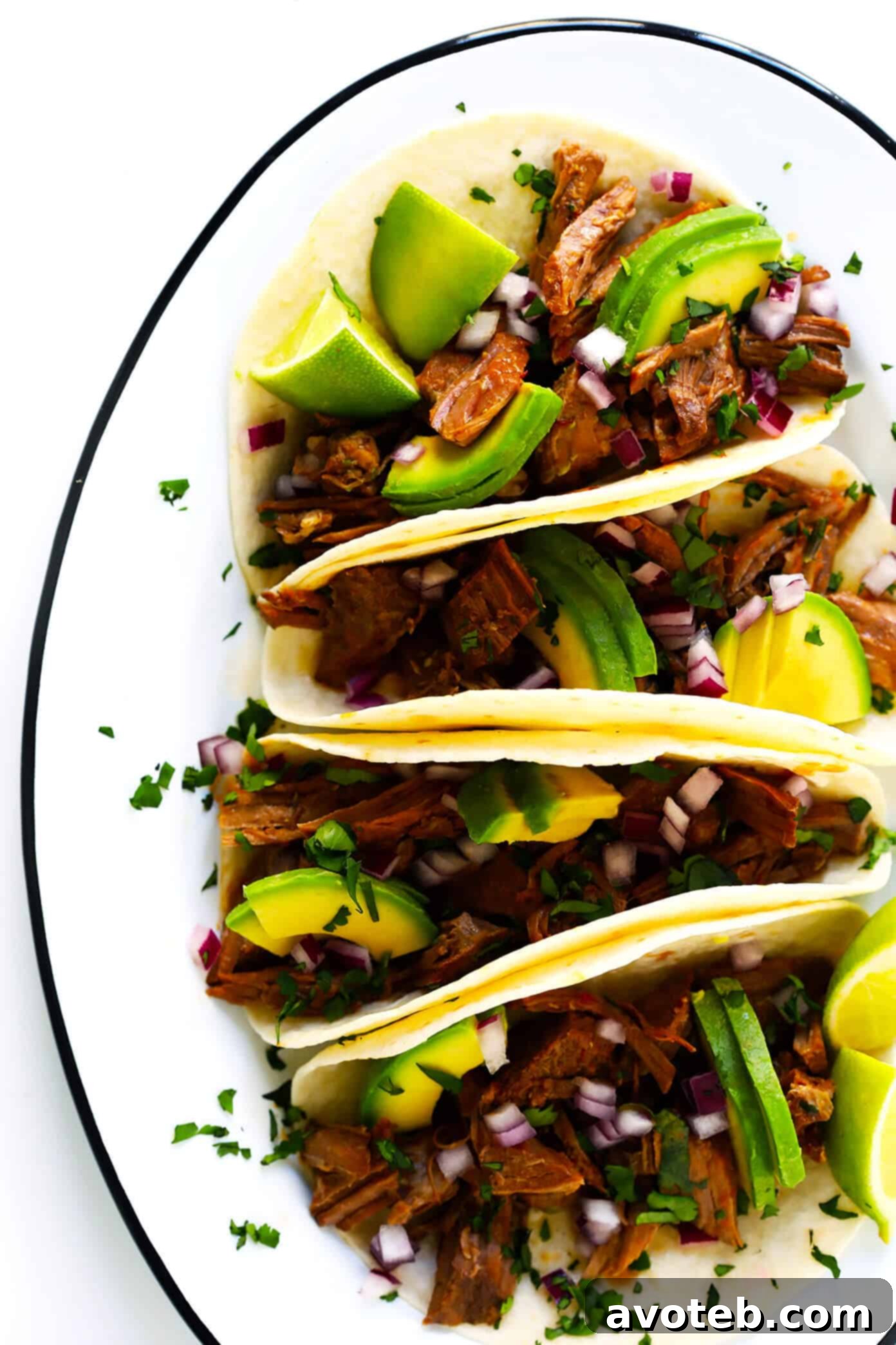 Delicious Instant Pot Barbacoa Beef Tacos ready to serve