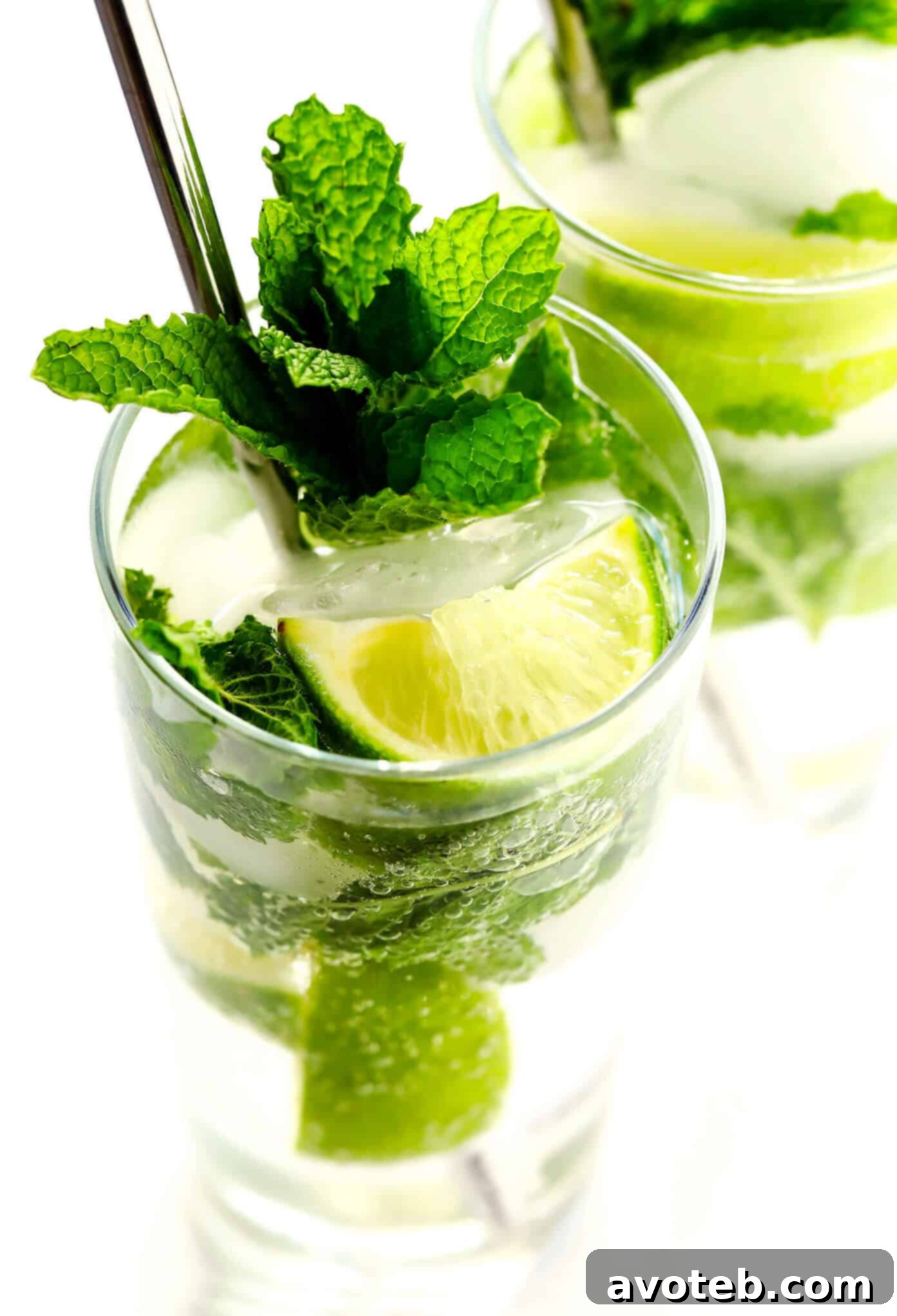 Truly the BEST mojito recipe! It's quick and easy to make with lots of fresh mint, lime juice and rum. It's naturally sweetened with honey. And easy to make in a single cocktail serving, or as a pitcher for a crowd. The perfect summer drink! | Gimme Some Oven #mojito #cocktail #drink #summer #recipe How To Make The Best Mojito Cocktail