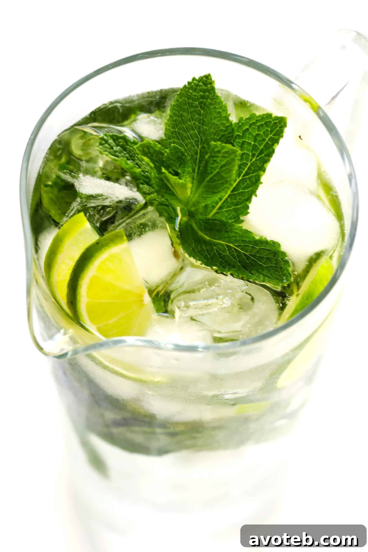 Truly the BEST mojito recipe! It's quick and easy to make with lots of fresh mint, lime juice and rum. It's naturally sweetened with honey. And easy to make in a single cocktail serving, or as a pitcher for a crowd. The perfect summer drink! | Gimme Some Oven #mojito #cocktail #drink #summer #recipe Mojito Pitcher Recipe for Parties