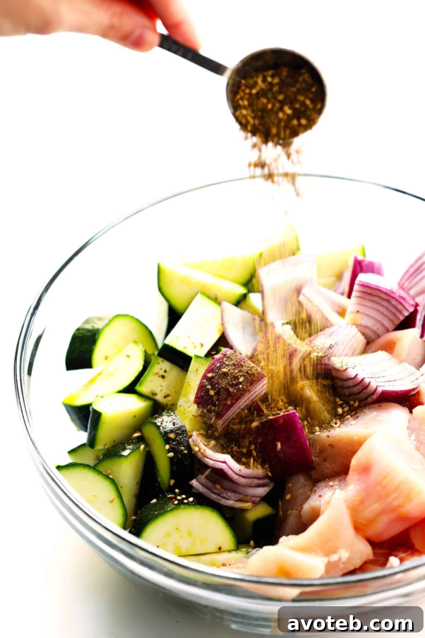 Step-by-step image of how to assemble Za'atar Chicken and Vegetable Kabobs.