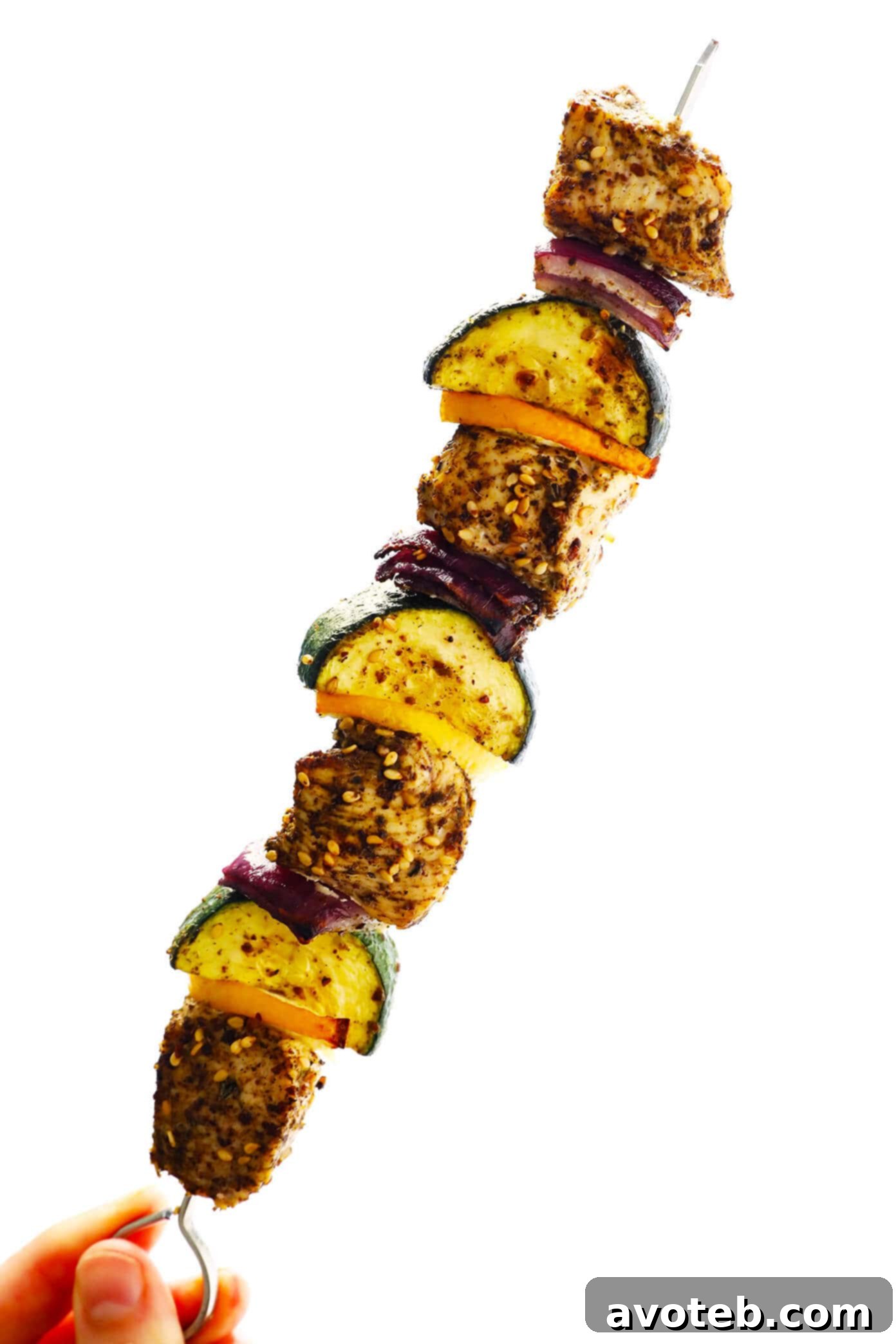 Za'atar Chicken, Zucchini, Red Onion, and Lemon Kabobs close-up.