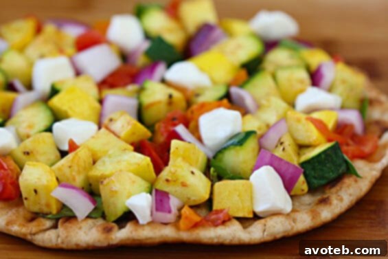 Close-up of Flatbread Veggie-Lovers Pizza slices ready to serve.