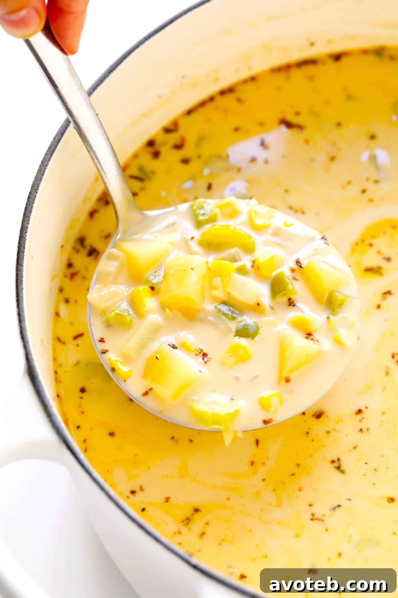 Cajun Corn Chowder: A zesty, healthy, vegan, and gluten-free corn chowder recipe. Lightened up with protein-packed lentils and creamy coconut milk, perfect for a flavorful summer or fall vegetarian dinner.
