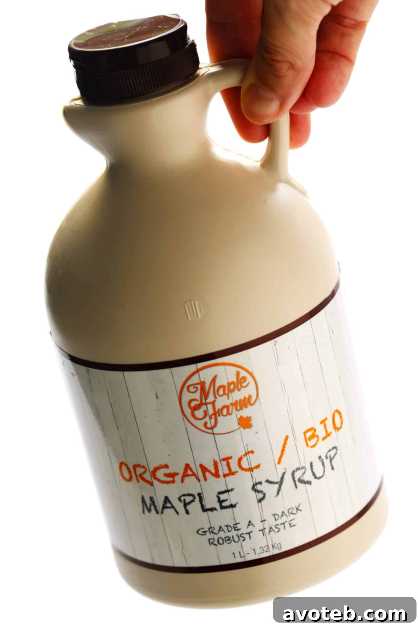 Maple Syrup for Old Fashioned Cocktail - A bottle of pure maple syrup, perfect for sweetening bourbon drinks.