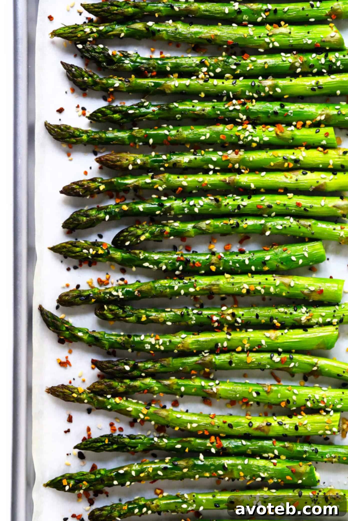Kick your roasted asparagus recipe up a notch this season with some everything bagel seasoning! It's super quick and easy to make, naturally vegan and gluten-free, and makes the most delicious healthy side dish. | Gimme Some Oven #asparagus #side #vegetable #healthy #dinner #thanksgiving #christmas #holiday #fall #winter "Everything" Roasted Asparagus Recipe - a healthy, easy, vegan, and gluten-free side dish perfect for any meal.