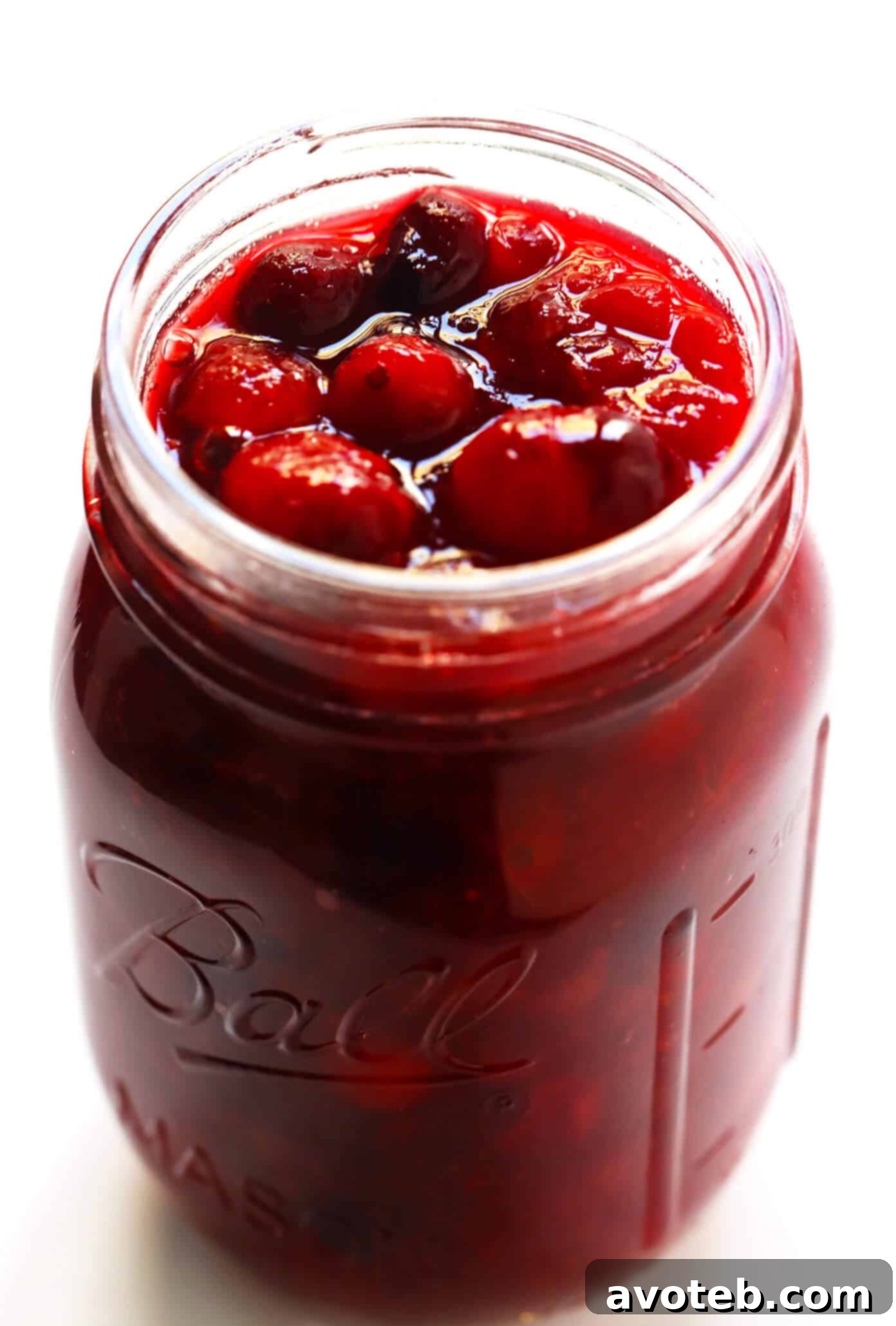 Maple Cranberry Sauce stored in a canning jar