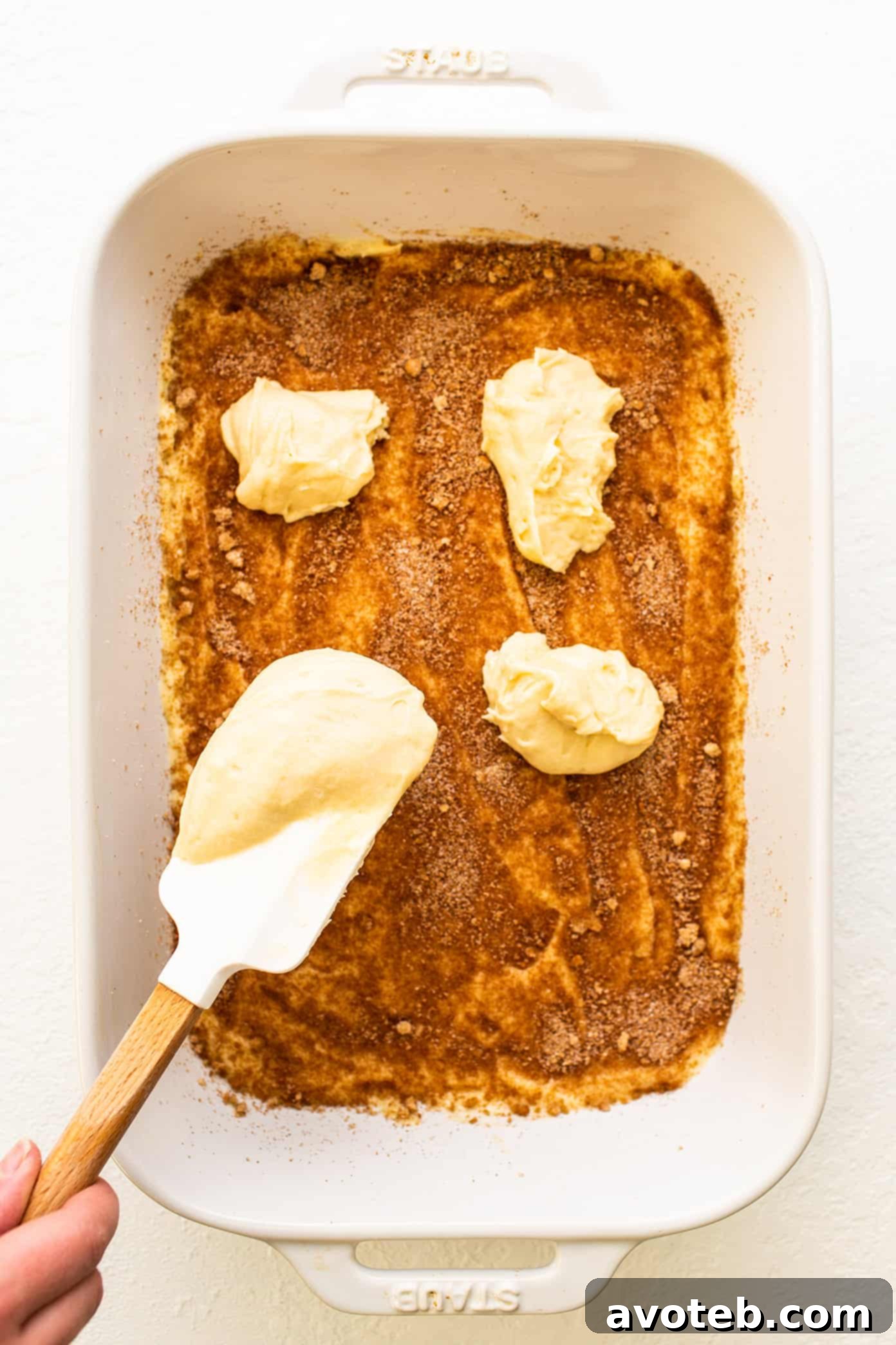 Layering the batter to make homemade sour cream coffee cake