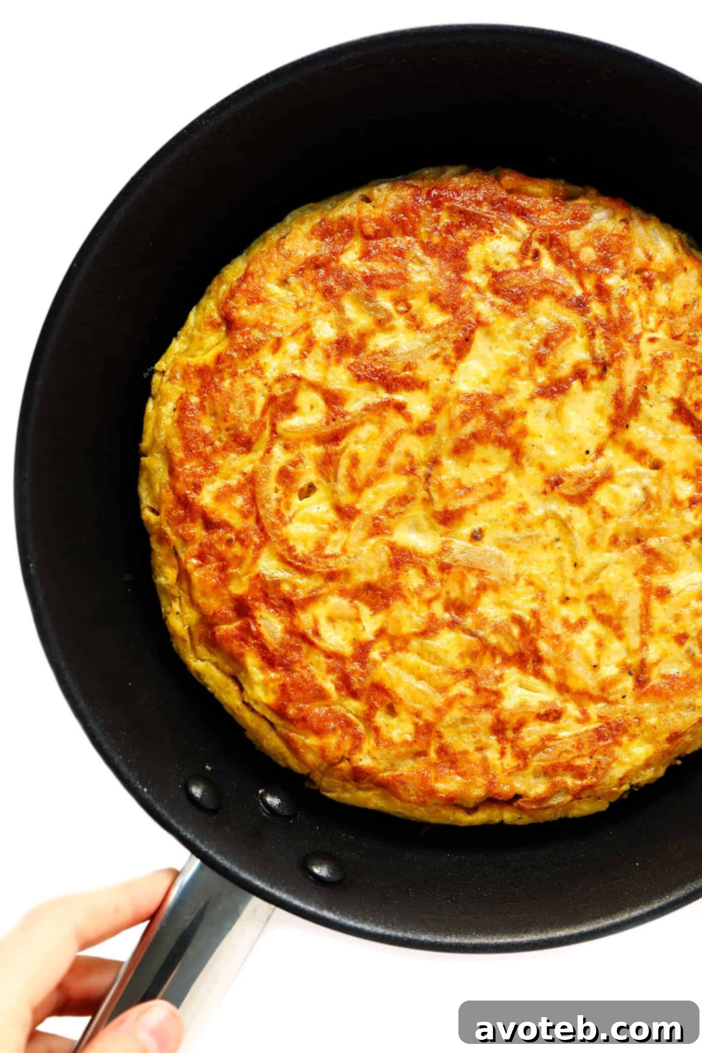 Step-by-step guide on how to make a Shortcut Spanish Omelette.