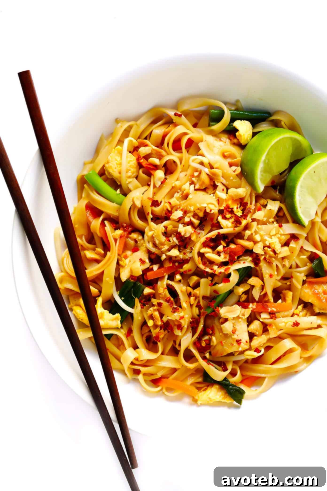 Chicken Pad Thai cooking in a wok