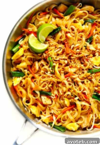 Homemade Chicken Pad Thai in a white bowl