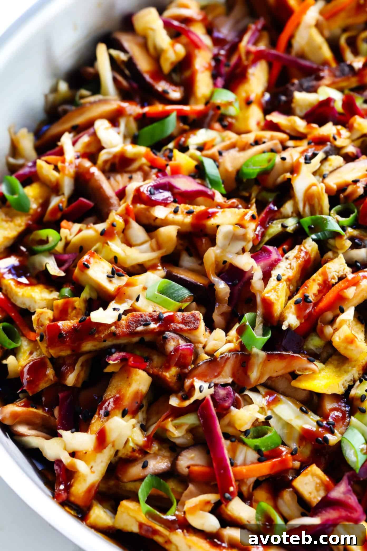 Vegetarian Moo Shu Recipe with Crispy Tofu - A close-up view of the delicious stir-fry, showcasing its vibrant ingredients and textures.