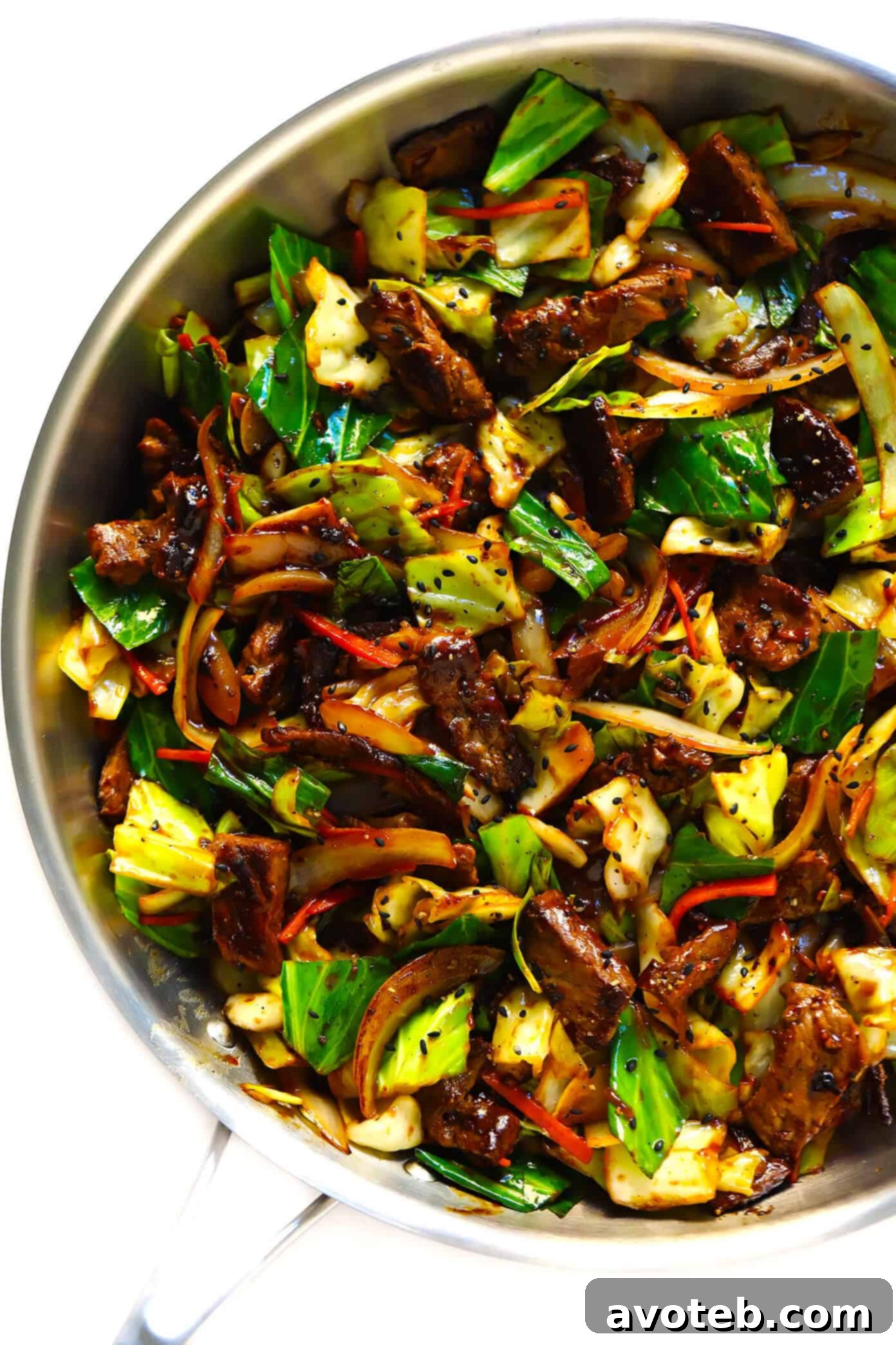 Prepared Sesame Beef and Cabbage Stir-Fry in a wok