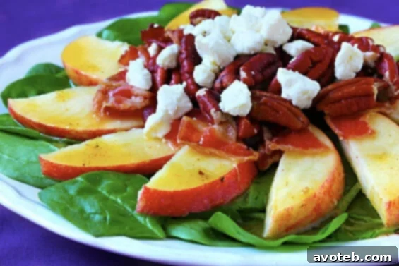 Delicious Apple Bacon Spinach Salad with toasted pecans and feta cheese