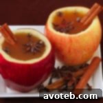 Thumbnail image of a finished apple cider cup, garnished with a cinnamon stick.