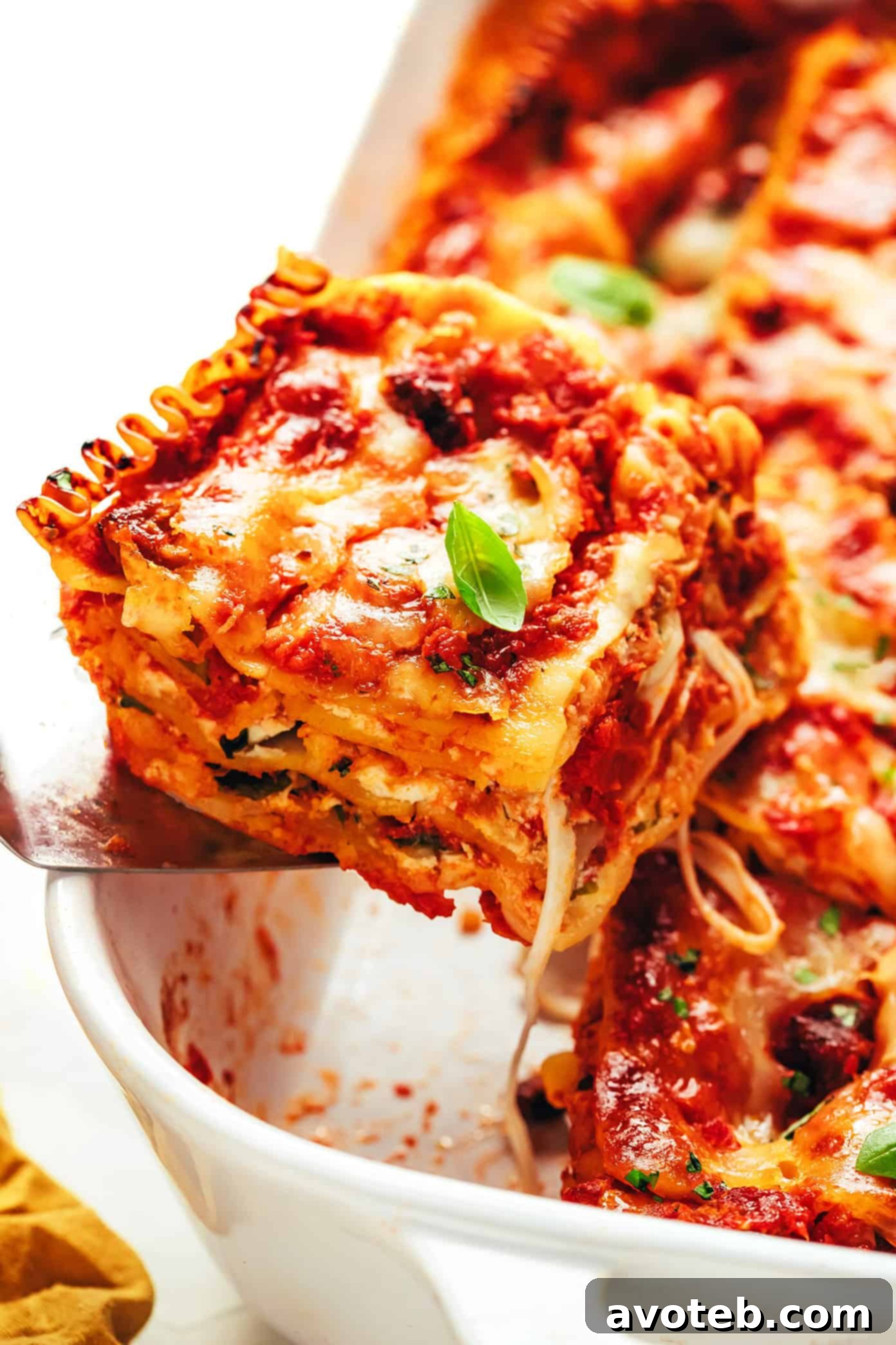 Various images of lasagna: one slice on a plate, a full pan, and close-ups of ingredients, suggesting preparation and serving.