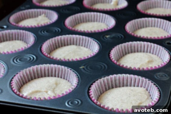 A trio of Vanilla Chai Cupcakes, elegantly frosted and ready to be enjoyed, showcasing their inviting texture.