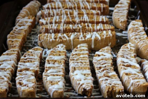 Pumpkin Pie Biscotti slices arranged on a cooling rack