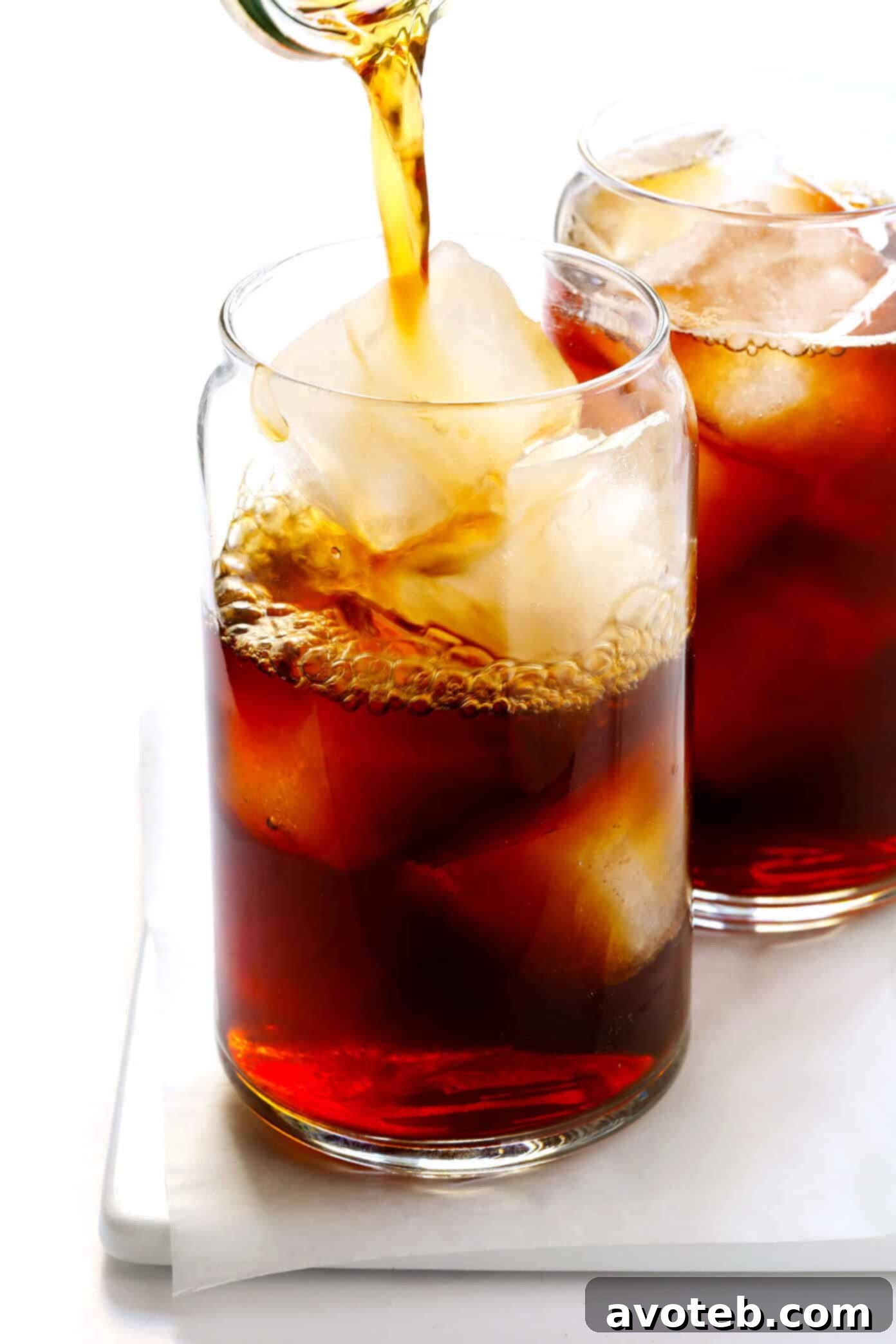 Delicious Pumpkin Cold Brew with creamy pumpkin spice foam in a tall glass, ready for a fall morning