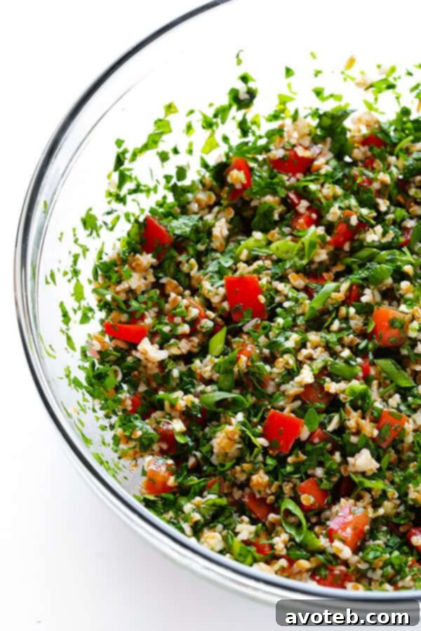 A close-up of the finished classic tabbouleh salad, showing its vibrant colors and inviting texture, ready to be served.
