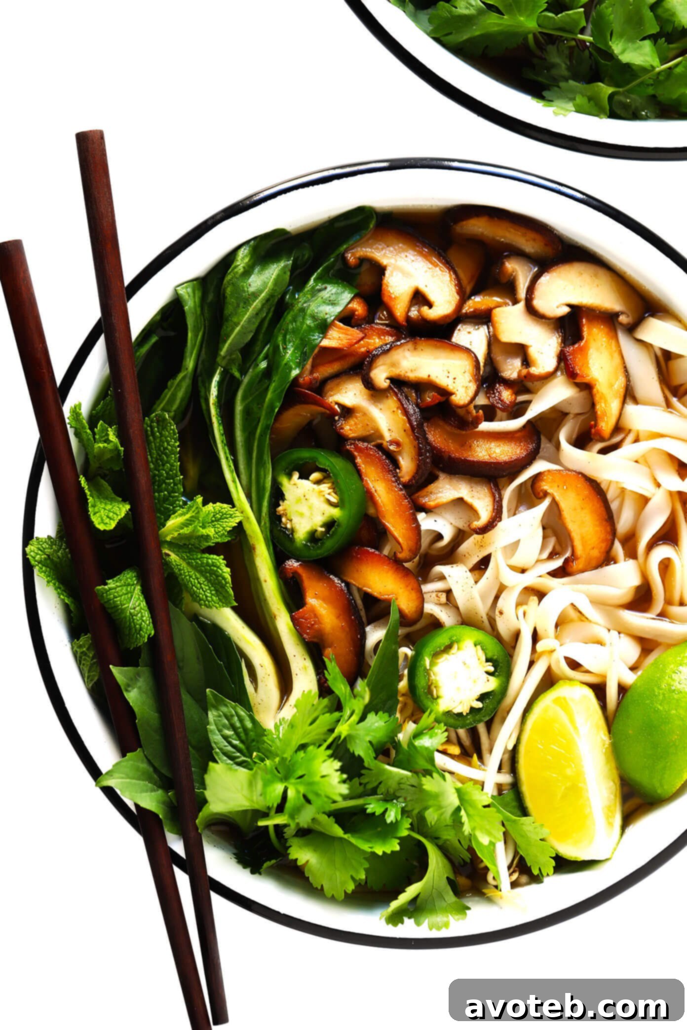 Delicious Vegan Pho with fresh herbs and vegetables