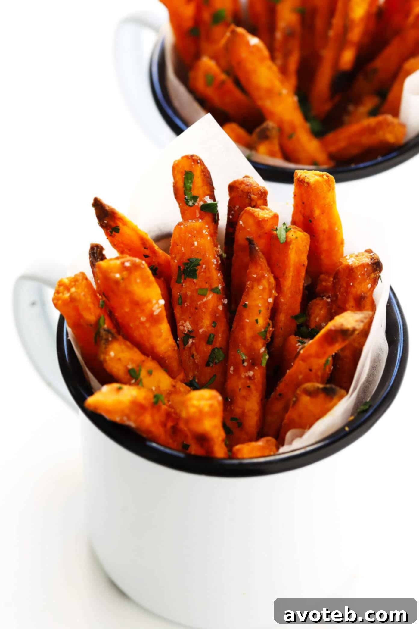 The BEST Sweet Potato Fries Recipe - Freshly sliced sweet potatoes ready for soaking and baking.