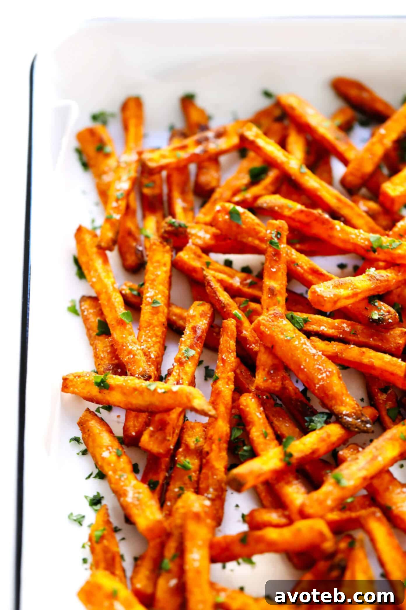 The BEST Sweet Potato Fries Recipe - Close-up of perfectly baked and seasoned sweet potato fries.