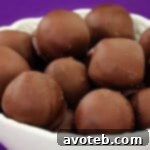 Thumbnail of a chocolate chip cookie dough truffle, showcasing its rich texture.