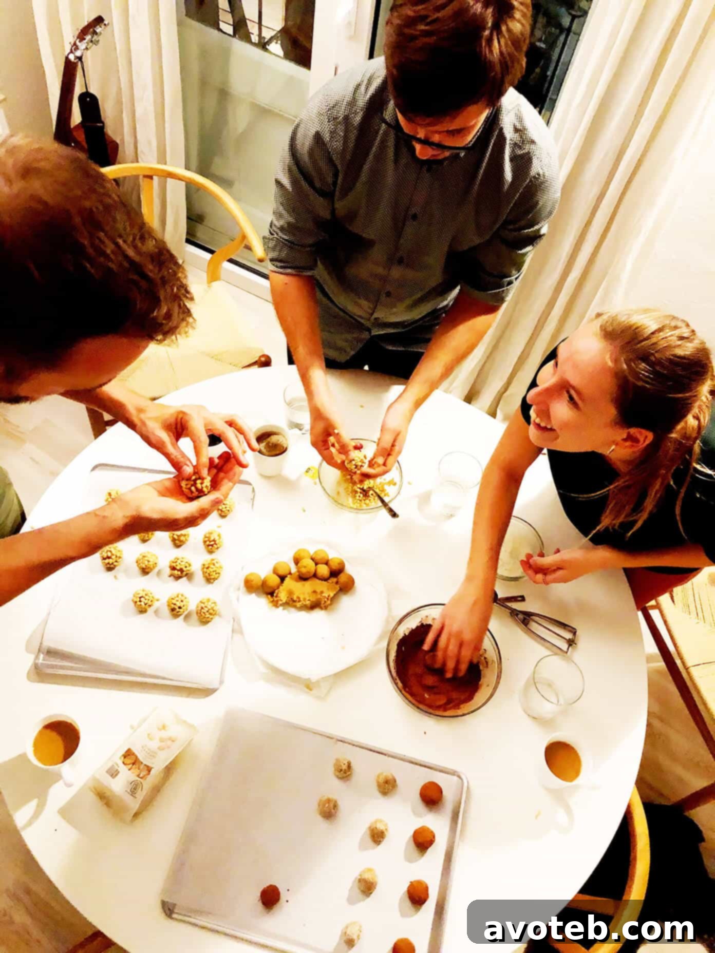 Friends enjoying a joyful Panellet making party, kneading marzipan and preparing toppings.