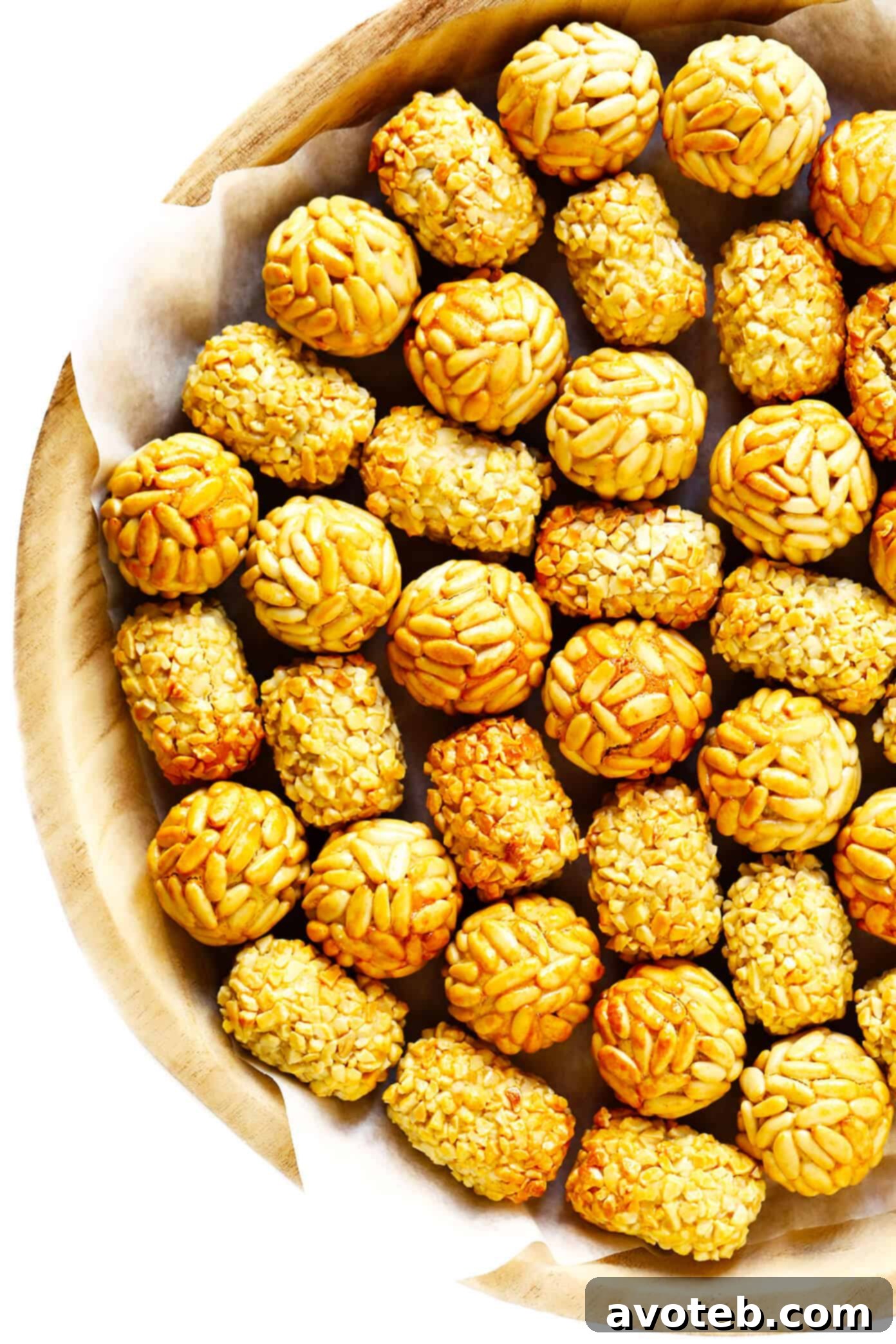 A beautifully presented collection of finished Panellets, showcasing the golden sheen and rich textures of these traditional Catalan sweets.