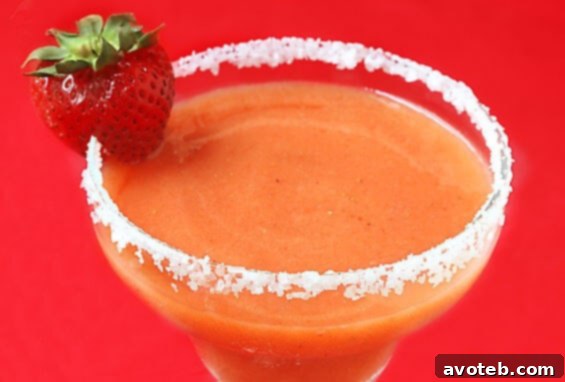 Festive Cinco de Mayo Dishes 4 Strawberry Mango Margaritas - A vibrant and refreshing cocktail, perfect for toasting during Cinco de Mayo festivities.