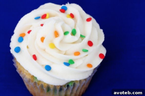 Close-up of freshly baked Funfetti Cupcakes on a cooling rack
