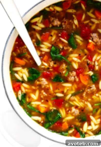 Italian Sausage and Orzo Soup Recipe - A comforting, easy-to-make dinner with savory sausage, tender orzo pasta, fresh vegetables, and a zesty tomato-herb broth. Perfect for cozy evenings and meal prep.