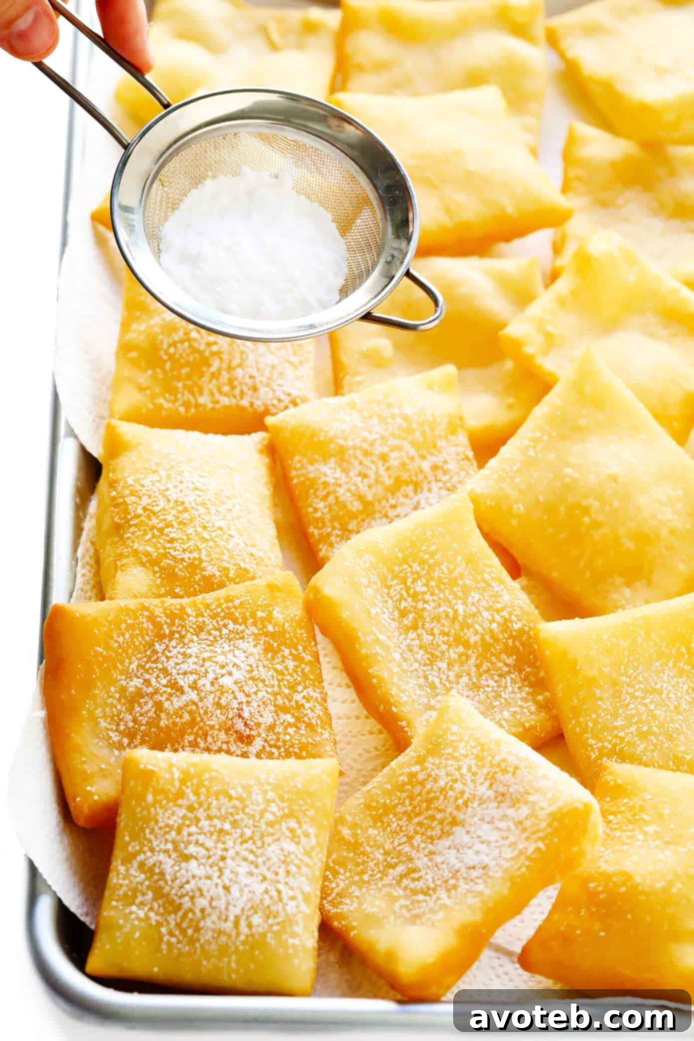 This restaurant-style sopapilla recipe is easy to make at home with pantry ingredients and always a crowd fave. Sprinkle your sopapillas in powdered sugar or dip in cinnamon-sugar -- up to you! | gimmesomeoven.com #sopapillas #dessert #mexican #texmex #donut #frybread #sweet Steps for Making Sopapillas at Home