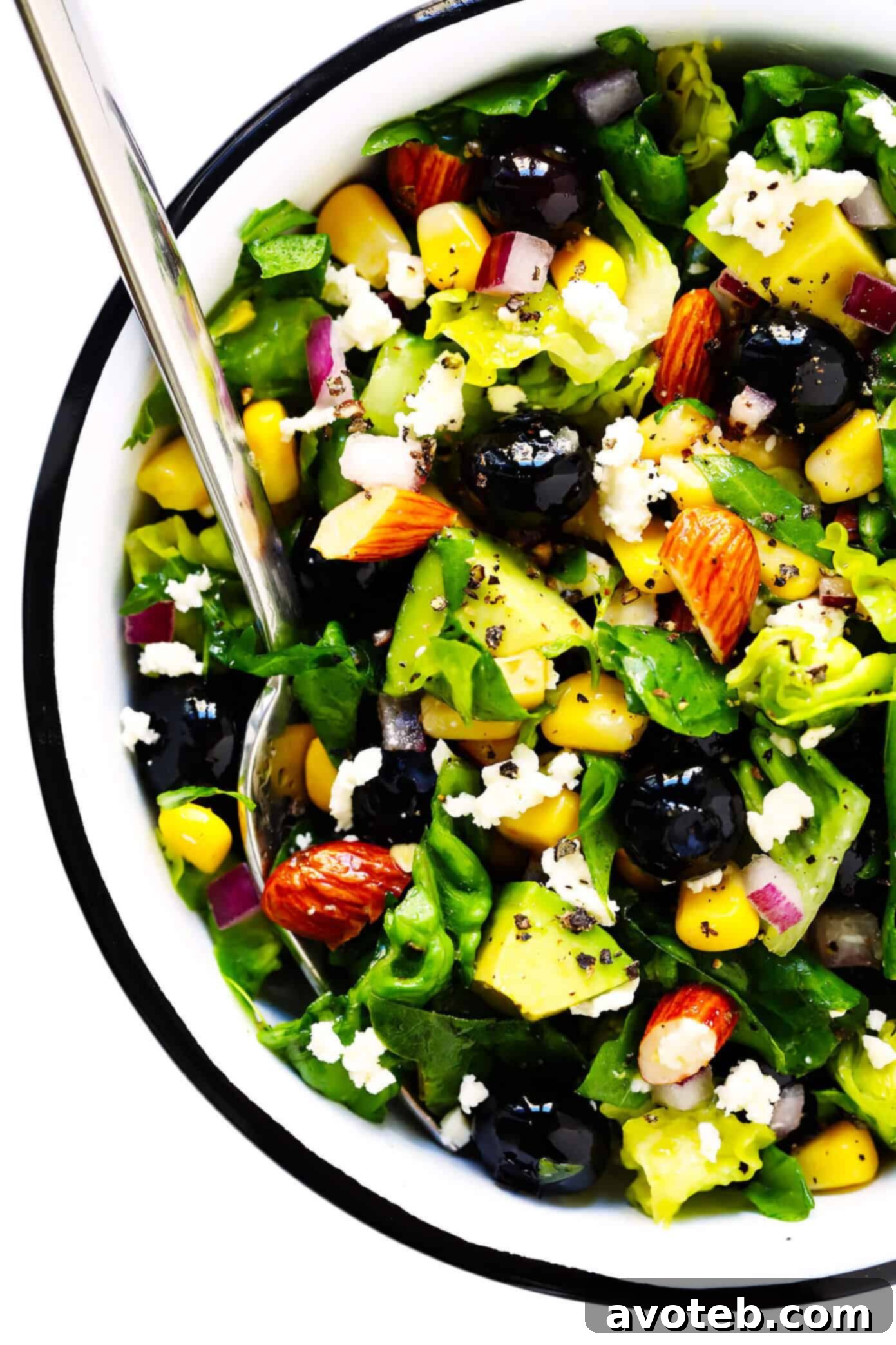 Serving bowl of corn, avocado and blueberry salad