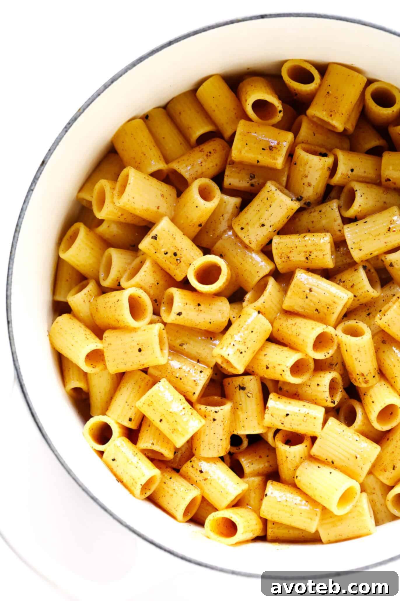 Rich and glossy Brown Butter Lemon Pasta in a bowl, garnished with fresh lemon zest and black pepper, perfect for a quick and delicious meal.